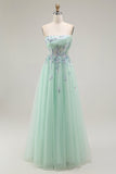Vestido largo de fiesta con corsé transparente de tul sin tirantes verde con apliques