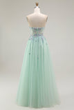 Vestido largo de fiesta con corsé transparente de tul sin tirantes verde con apliques