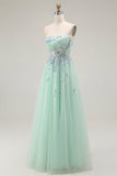Vestido largo de fiesta con corsé transparente de tul sin tirantes verde con apliques