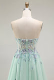 Vestido largo de fiesta con corsé transparente de tul sin tirantes verde con apliques