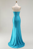 Vestido de fiesta azul con corsé sin tirantes de sirena con abertura de volantes