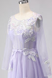 Vestido largo de tul con plique de línea Lila A y manga larga