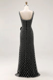 Vestido largo de fiesta con tirantes de espagueti de sirena con cuentas negras y lazo lateral de estrás con abertura