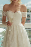 Vestido de novia midi de marfil con encaje al hombro descubierto