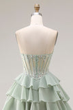 Corsé de chiffon de capas con volantes verde polvoriento y vestido largo de graduación con abertura