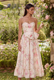 Vestido midi sin tirantes con moño rosa de flores blancas y estampado en línea A