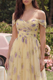 Vestido midi de flor amarilla con línea A y hombros descubiertos con volantes