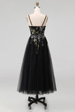 Vestido midi negro de tul con tirantes finos con líneas de aplicación