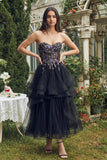 Vestido midi negro sin tirantes de organza de línea A con apliques,