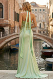 Corsé de corte con capestro y vestido largo de sirena verde claro con cuentas y abertura