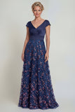 Lentejuelas azul marino Un vestido largo de madre de la novia con escote en V y mangas gorras