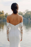 Vestido de novia de cola de sirena de satén de marfil con mangas