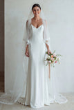 Vestido de novia de tirantes finos de marfil con cola de sirena y encaje