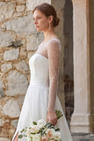 Vestido de novia bohemio de manga larga con cuentas y mangas largas con cuentas y corte brillante