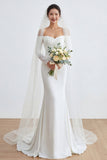 Vestido largo de novia de sirena marfil con apliques