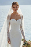 Vestido de novia de encaje largo con sirenas de marfil y apliqueos