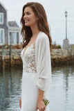Vestido de novia de satén aplicado a sirenas de marfil con cola de corte
