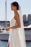 Vestido largo de novia de satén de encaje de marfil con abertura