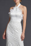 Vestido largo largo de novia con hollanes blancos y funda con húmenes