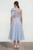 Vestido midi rosa floral con arco y cuello redondo, bolsillos