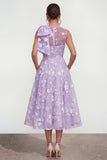 Vestido midi rosa floral con arco y cuello redondo, bolsillos