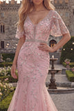 Vestido de graduación de tul largo con cuello en V y cuenta con sirena azul brillante y aplicables