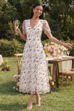 Vestido midi floral blanco rosa de tul en pico con escote en V y manga corta