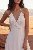 Vestido de novia bohemio largo con volantes y línea A en marfil