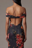 Vestido negro floral con estampado al descubierto