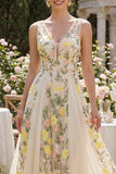Vestido midi floral bordado con tul y tul en línea A