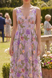 Vestido midi floral bordado en línea A de tul lila y escote en V