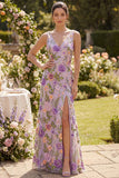 Vestido largo floral bordado en tul de tul lila con abertura