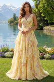 Vestido largo largo de graduación amarillo floral con escote en V y volantes y lazo