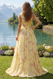 Vestido largo largo de graduación amarillo floral con escote en V y volantes y lazo