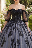 Vestido de baile negro con aplíquas descubiertos en la Quinceañera