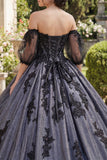 Vestido de baile negro con aplíquas descubiertos en la Quinceañera