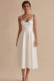Vestido de compromiso blanco de tirantes finos con llazo
