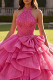 Vestido de gala Quinceañera con volantes fucsia con lazos