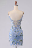 Corsé transparente azul bordado con flores y cortes transparentes