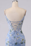 Corsé transparente azul bordado con flores y cortes transparentes