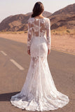 Vestido de novia bohemio transparente de manga larga y encaje sirena marfil