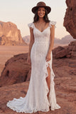 Vestido de novia bohemio con volantes y sirena de encaje marfil y abertura