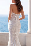 Vestido de novia de sirena arrugado de marfil con lentejuelas