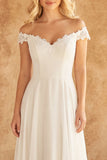 Vestido de novia de encaje marfil con encaje marfil descubierto