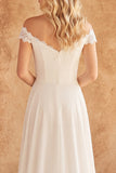 Vestido de novia de encaje marfil con encaje marfil descubierto