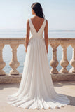 Vestido de novia de chiffon fruncido en marfil con escote en V y línea A
