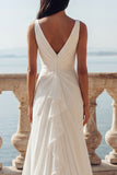 Vestido de novia de sirena con escote en V y volantes en marfil