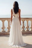 Vestido de novia de gasa con volantes recortados en marfil de un hombro