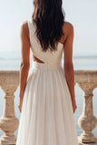 Vestido de novia de gasa con volantes recortados en marfil de un hombro