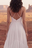 Tirantes finos de marfil Un vestido de novia bohemio con volantes en línea y abertura
